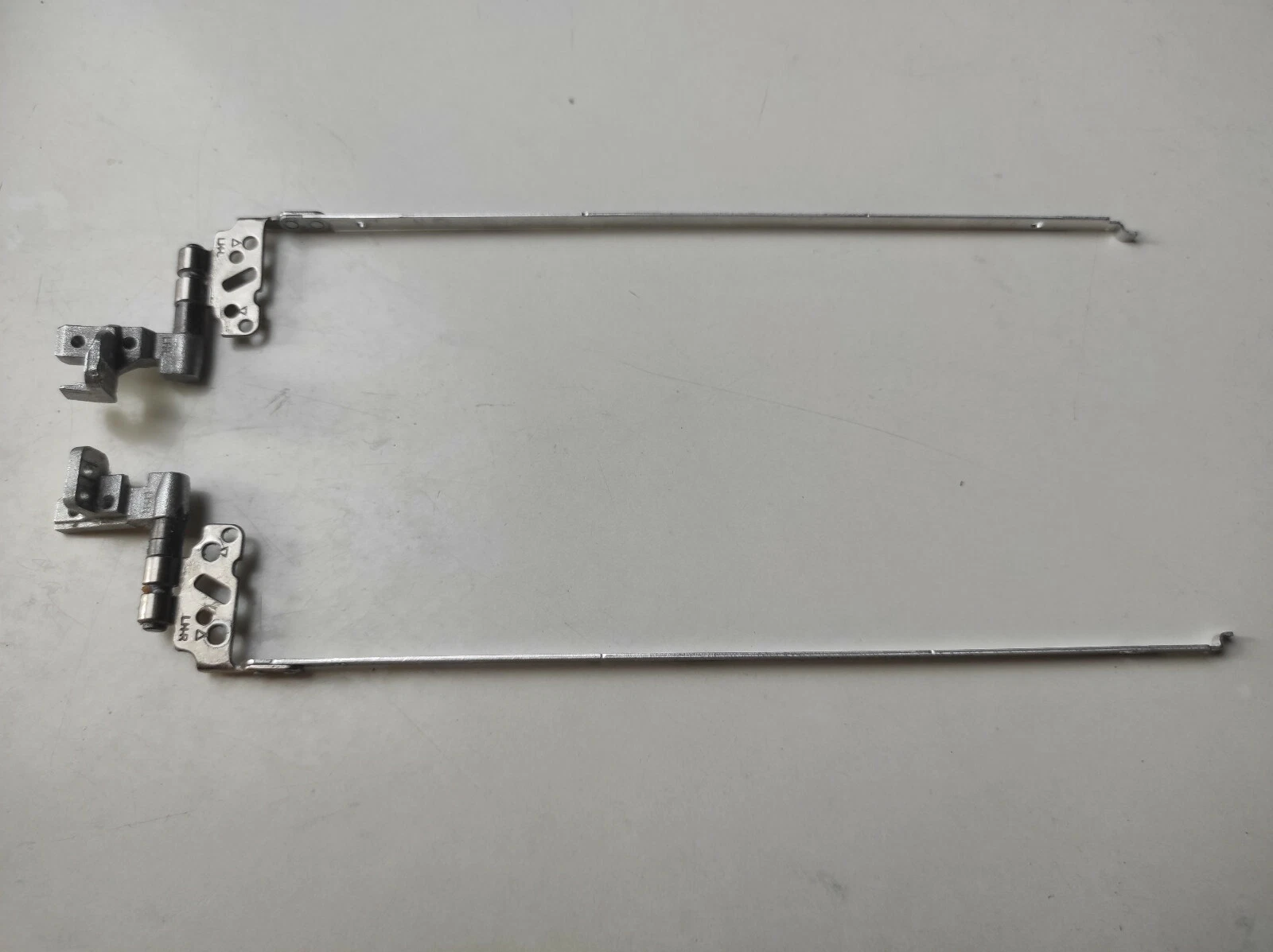 hp 2560 laptop hinge pair replacement left and right.webp hp 2560 laptop hinge pair replacement left and right.webp
